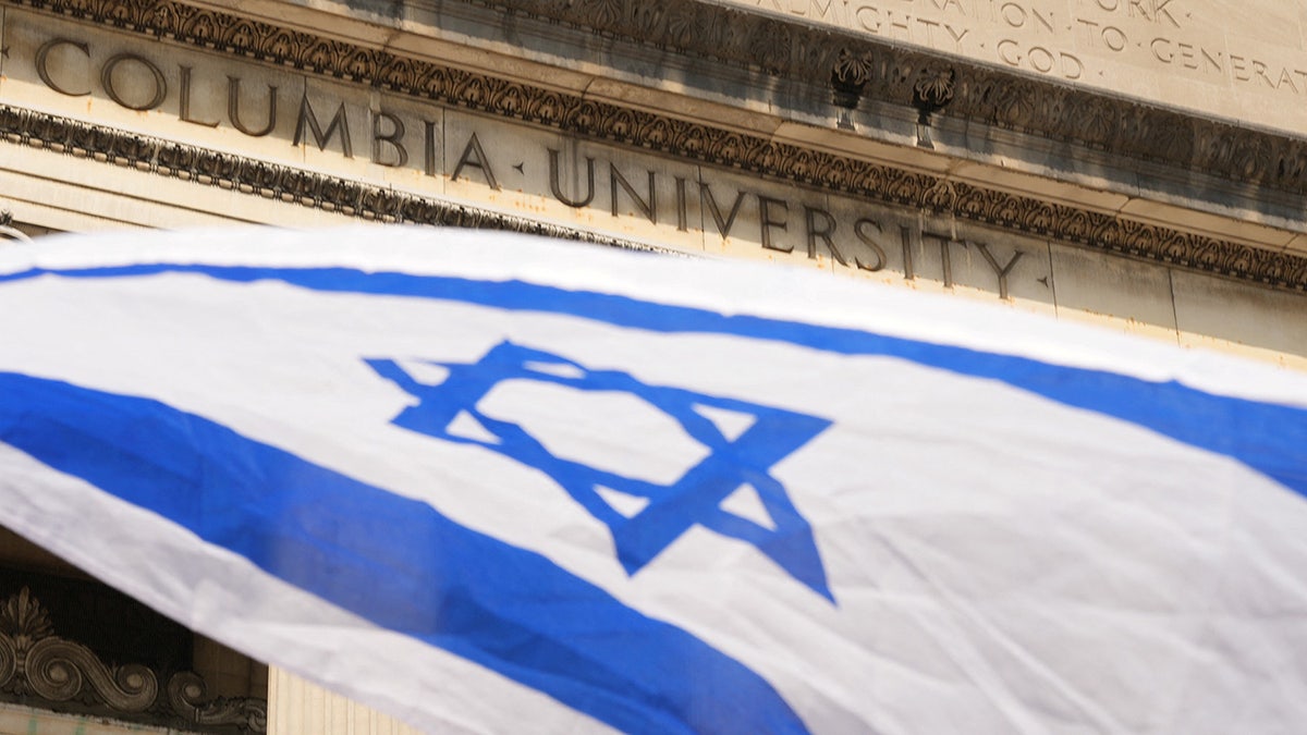 The Israeli flag waves at a protest encampment in support of Palestinians at the Columbia University