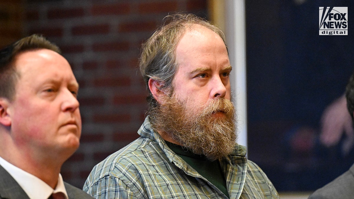 Craig Nelson Ross Jr. stands in court during his sentencing.