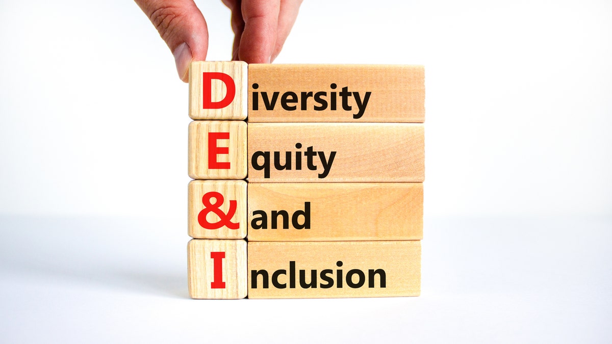 DEI, diversity, equity and inclusion on wooden cubes
