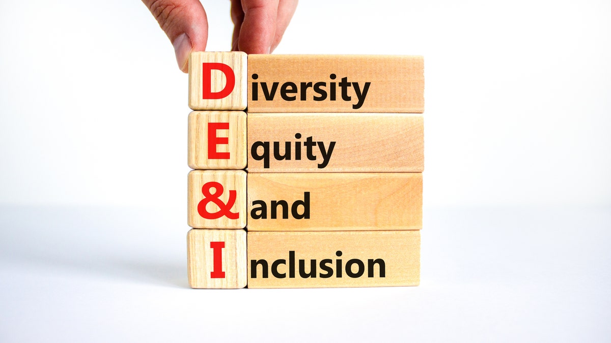 DEI, diversity, equity and inclusion on wooden cubes