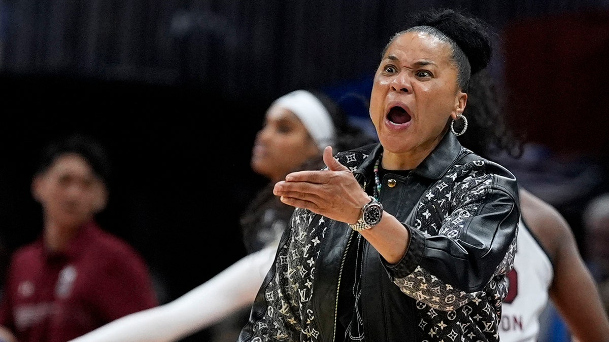 Dawn Staley directs on the sideline