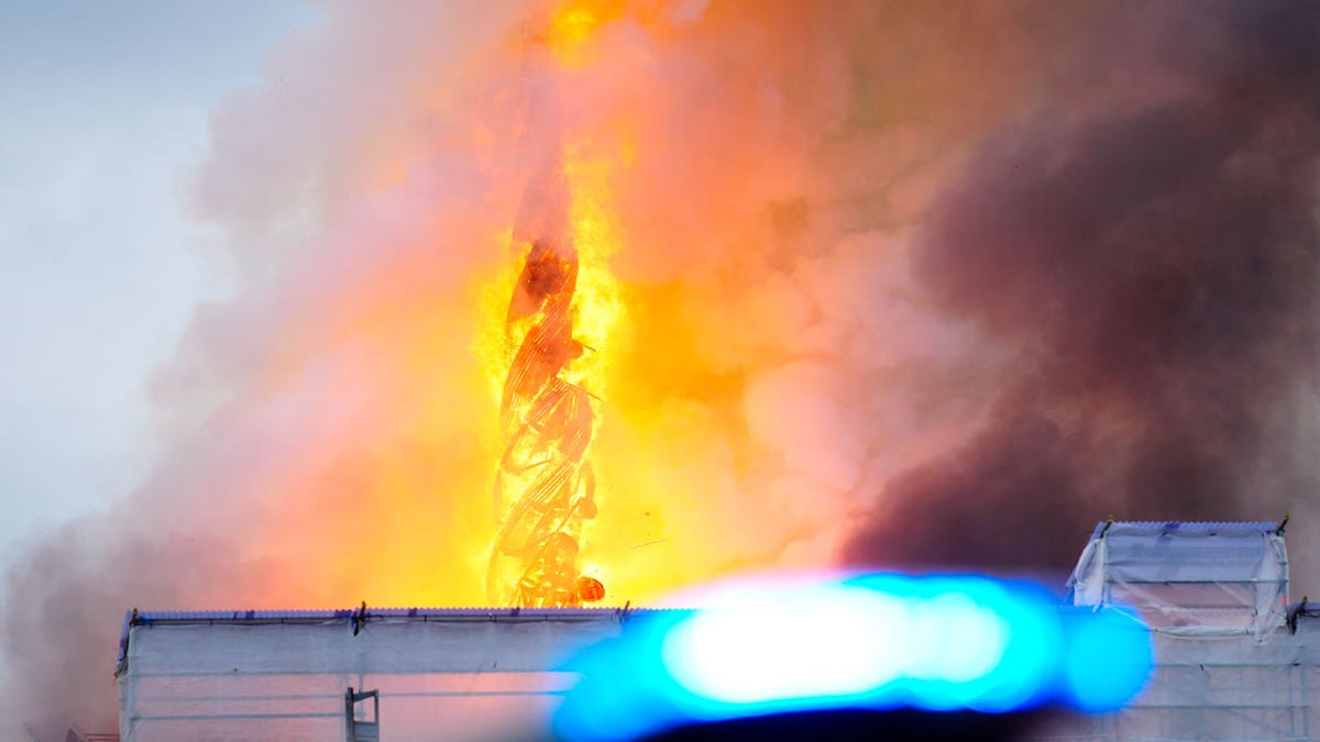 Fire and smoke rise out of the Old Stock Exchange in Copenhagen, Denmark