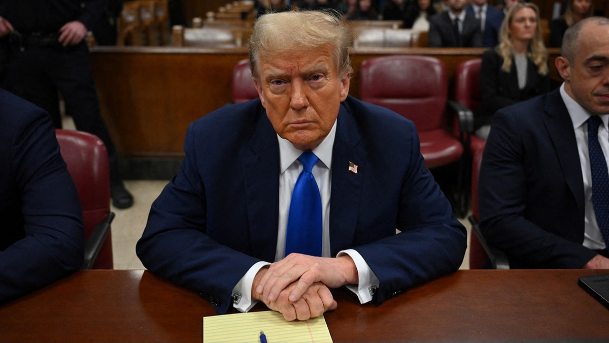 Donald Trump sitting successful courtroom