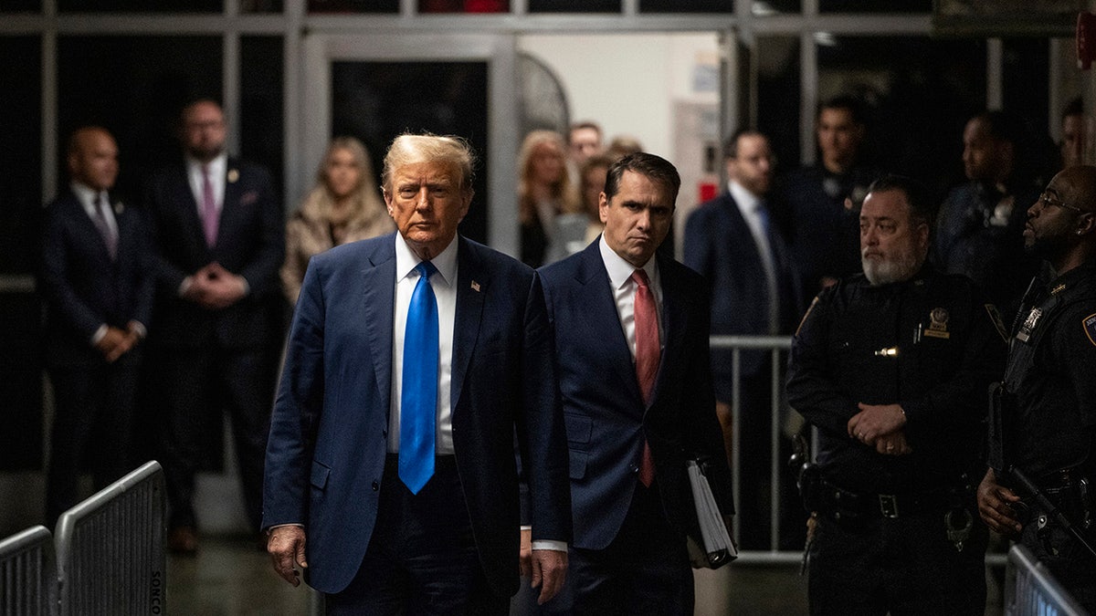 Donald Trump arrives to tribunal  connected  the archetypal  time  of opening   arguments successful  his proceedings  astatine  Manhattan Criminal Court