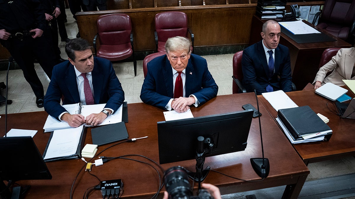 Former U.S. President Donald Trump appears with his legal team Todd Blanche, and Emil Bove ahead of the start of jury selection at Manhattan Criminal Court