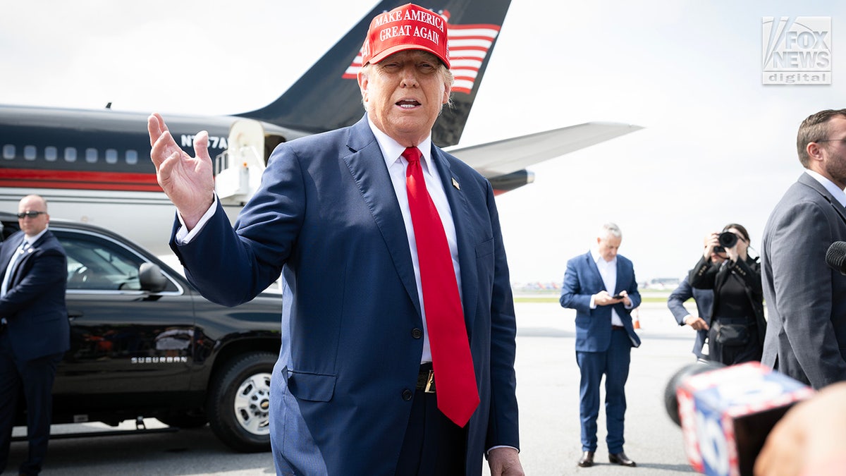 Former President Donald Trump arrives astatine Atlanta’s Hartsfield-Jackson Airport successful Georgia