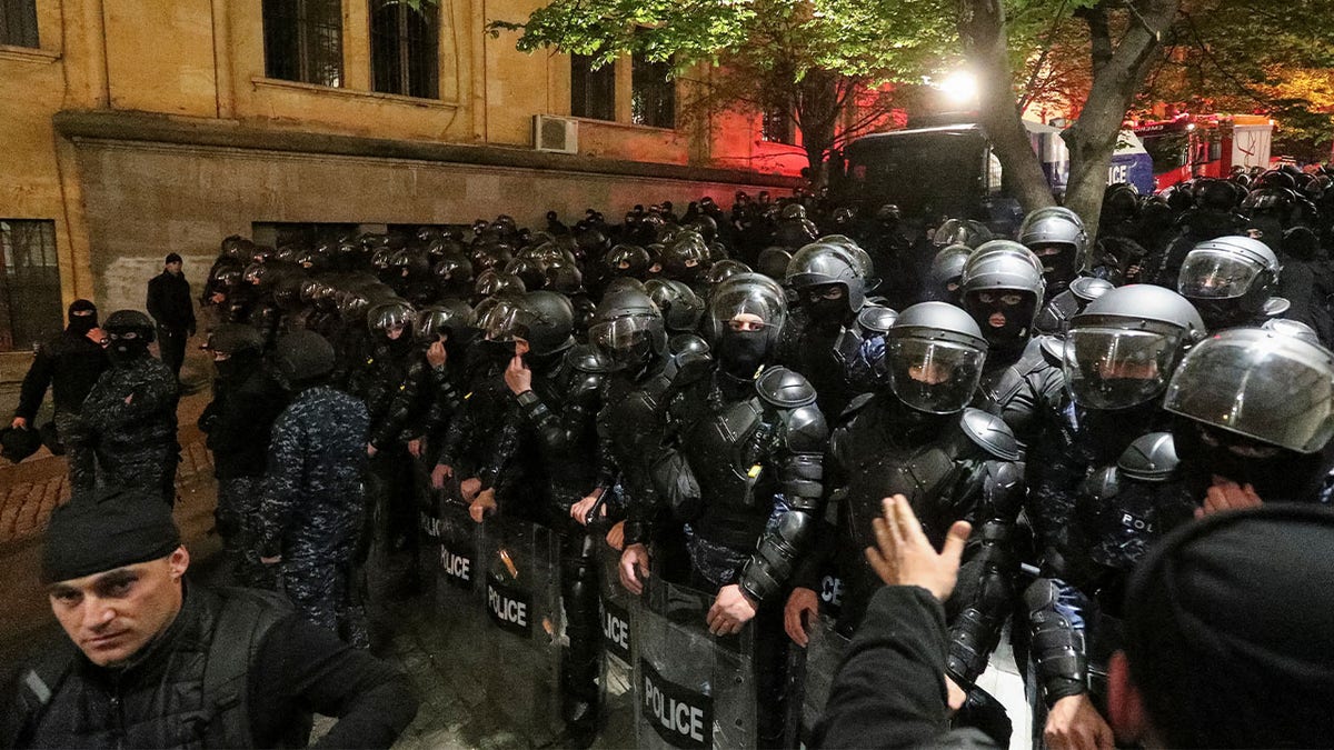 police confront protesters in georgia