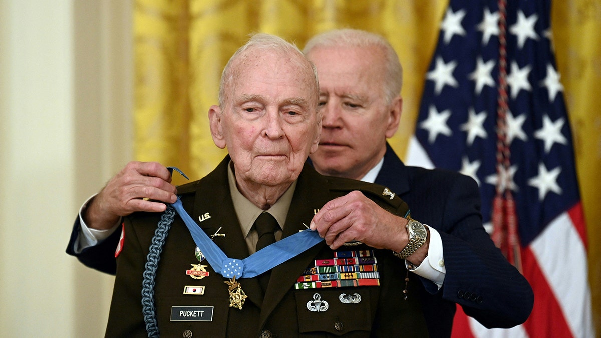 Biden presenting a medal