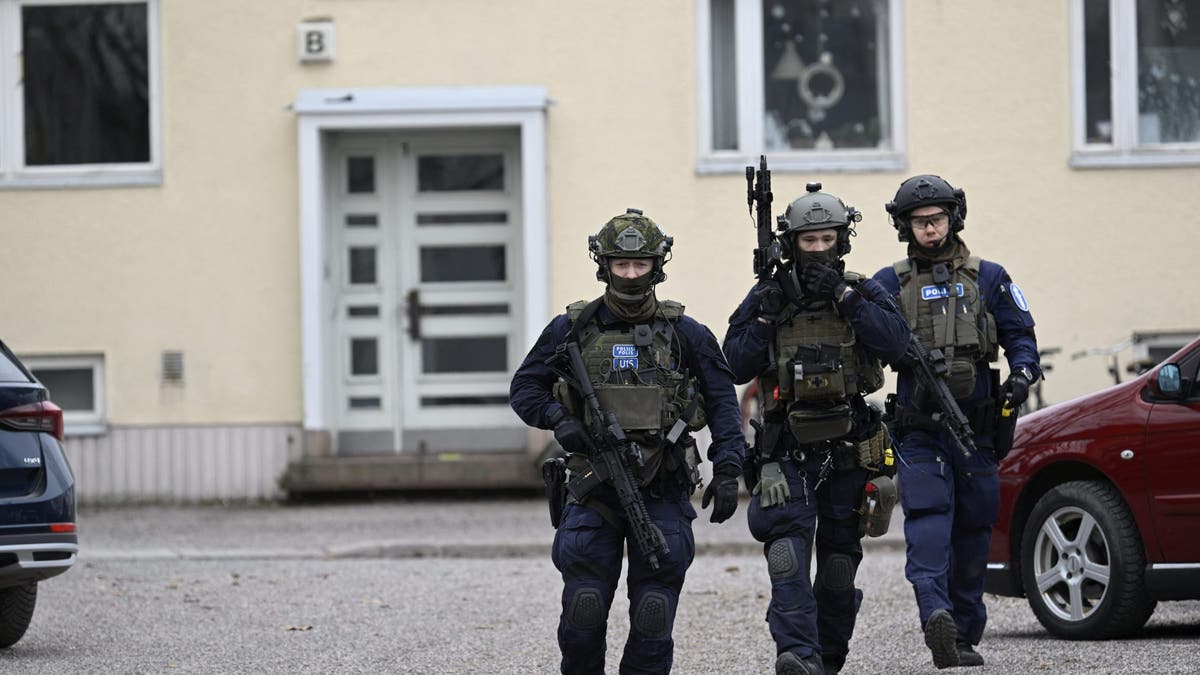 Finnish police investigate the scene at the primary school Viertola comprehensive school where a child opened fire and injured three other children, on April 2, 2024 in Vantaa, outside the Finnish capital Helsinki. Police said, that the attacker was in custody, and "All those involved in the shooting incident are minors."