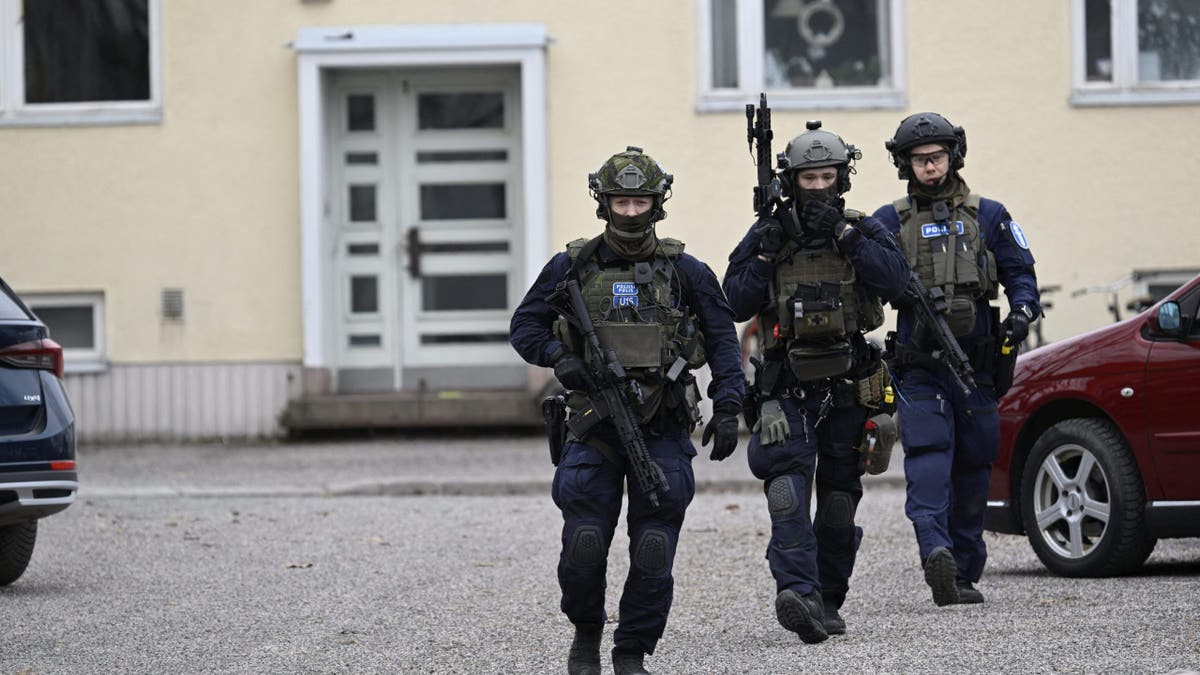 Finnish police investigate the scene at the primary school Viertola comprehensive school where a child opened fire and injured three other children, on April 2, 2024 in Vantaa, outside the Finnish capital Helsinki. Police said, that the attacker was in custody, and "All those involved in the shooting incident are minors."