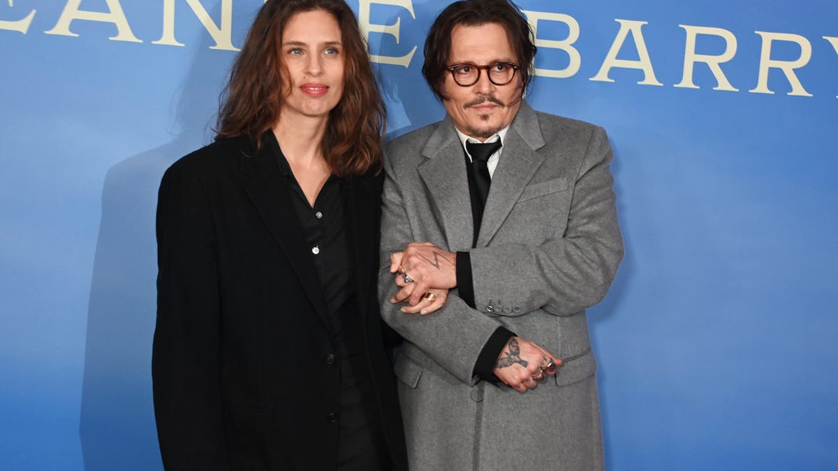 maiwenn and johnny depp at jeanne du barry red carpet