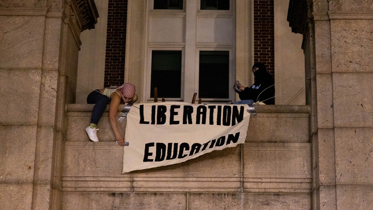 A sign that reads, 'Liberation education'