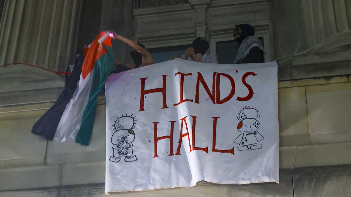 A motion that reads, 'Hinds Hall'