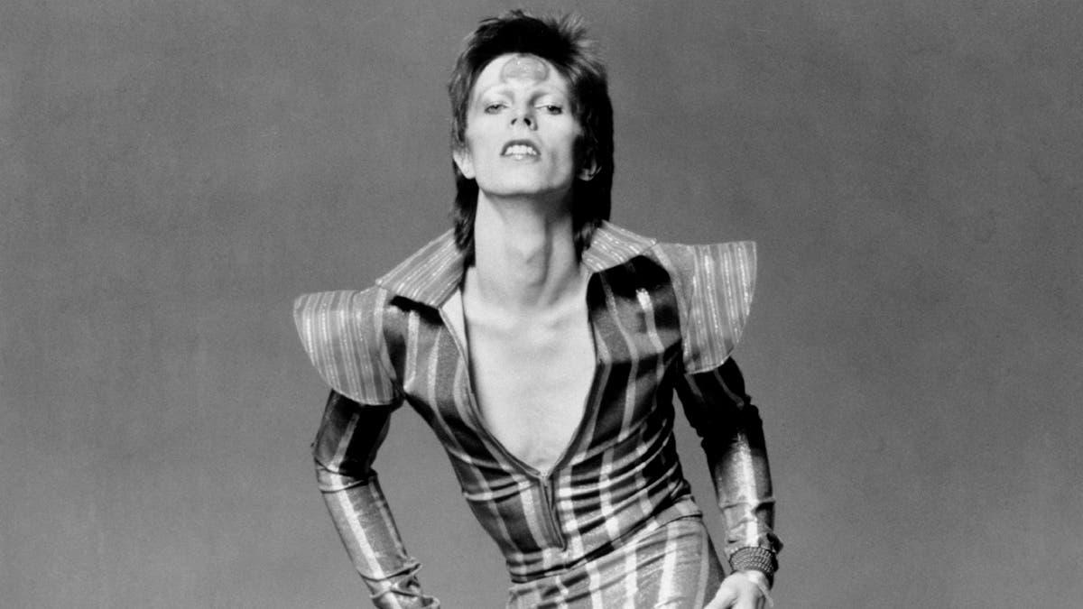 David Bowie posing as Ziggy Stardust