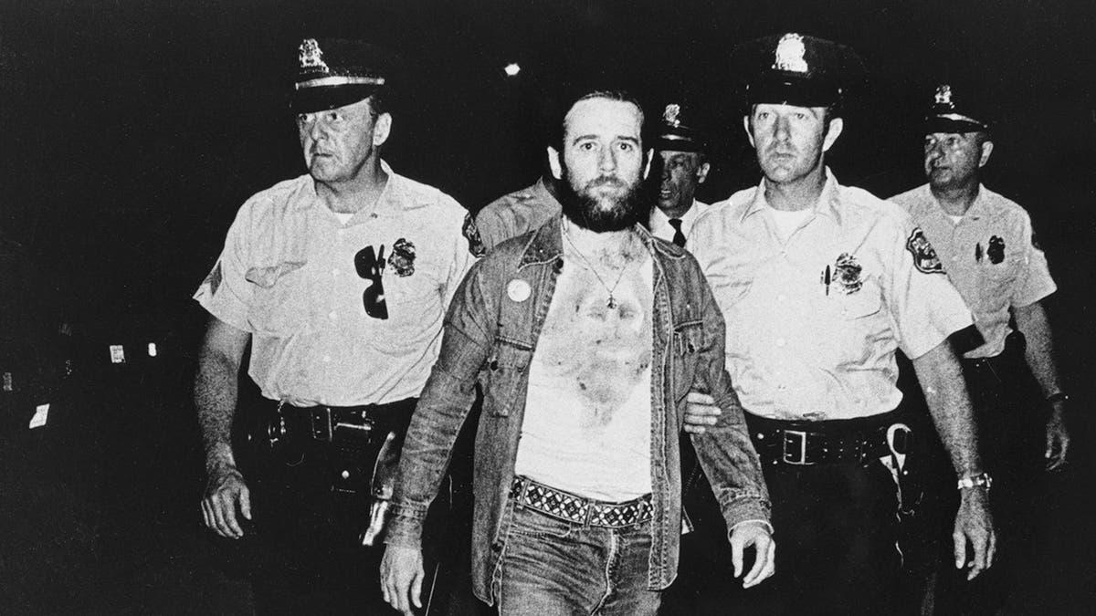 George Carlin getting arrested by two cops