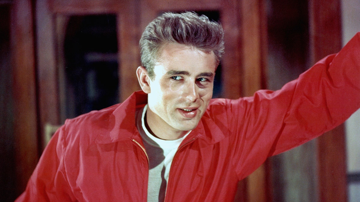 A close-up of James Dean in a red jacket