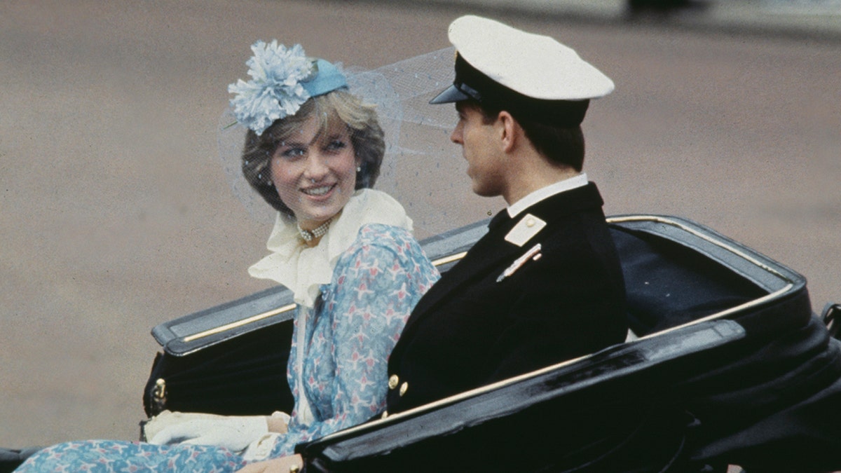 Princess Diana in a carriage looking at Prince Andrew