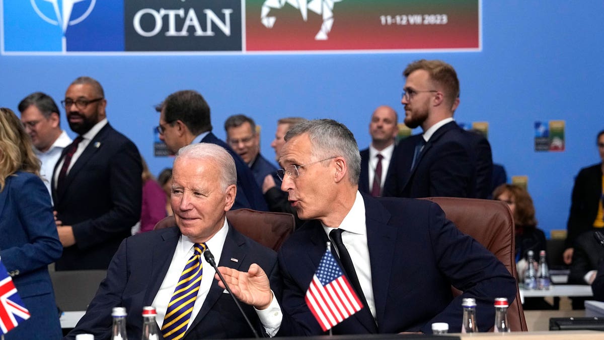 NATO Secretary General Jens Stoltenberg speaks with United States President Joe Biden