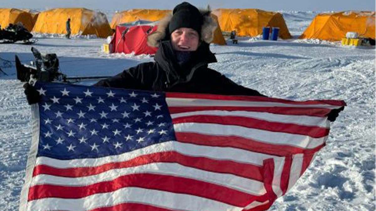 Bill Hemmer holds American flag