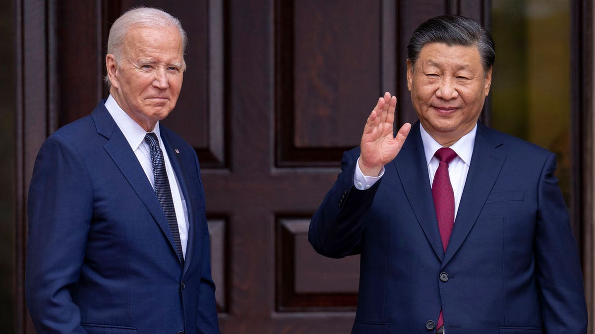 President Joe Biden greets China's President President Xi Jinping