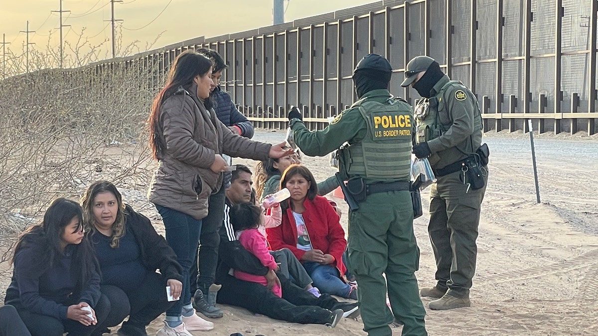 migrants at border in New Mexico in April 2024