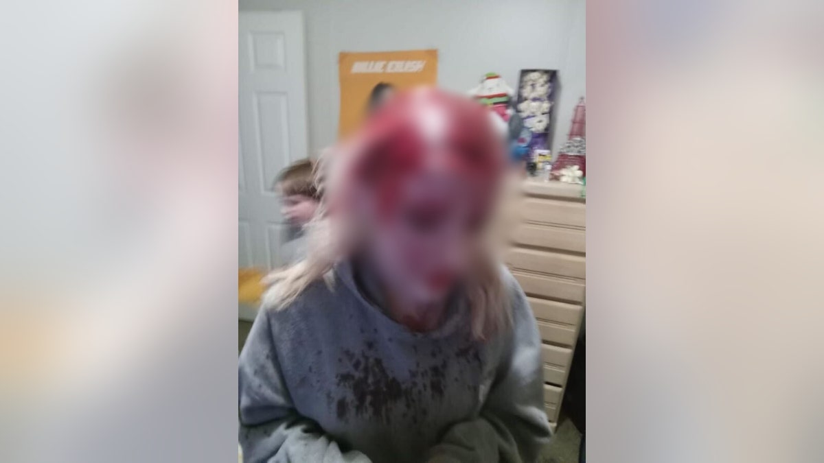 A blurred photograph of humor covering Emma Filback's head