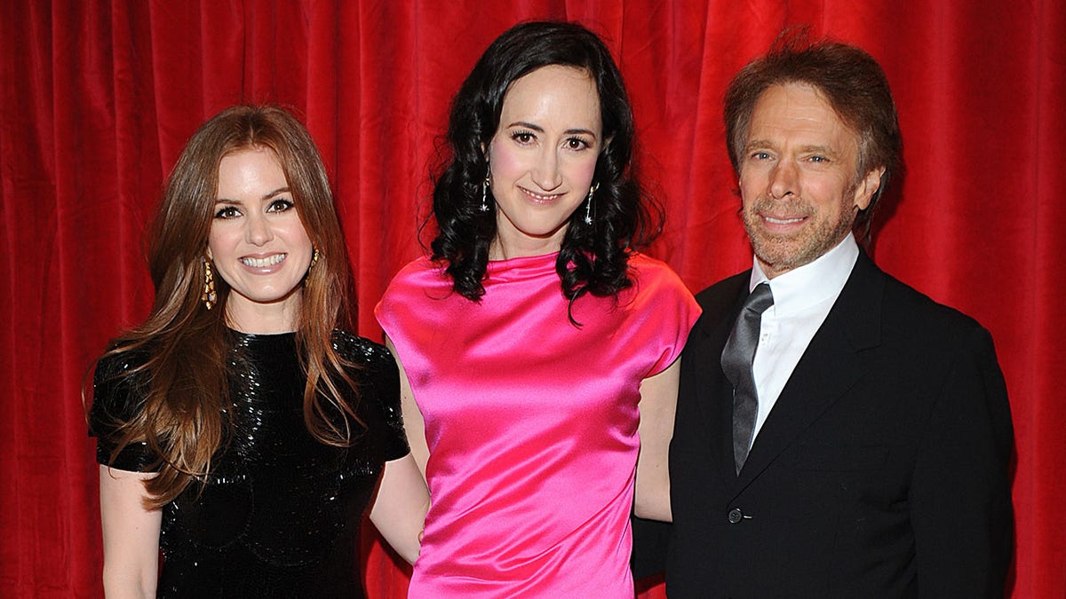 Isla Fisher, Sophie Kinsella, and Jerry Bruckheimer posing together