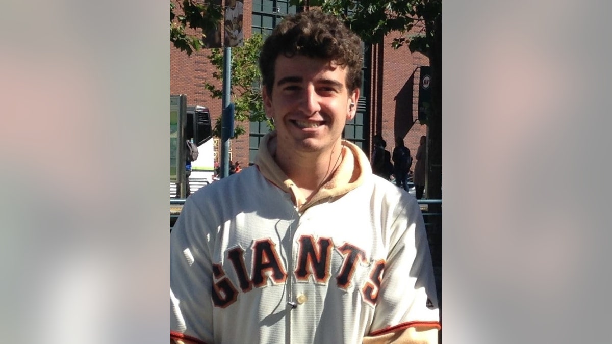California college grad the 14th person to fall off 'serial killer' cliffs; family says death 'preventable' Jake Parker wearing a Giants sweatshirt