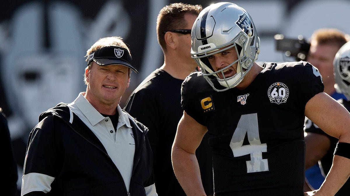 Jon Gruden and Derek Carr