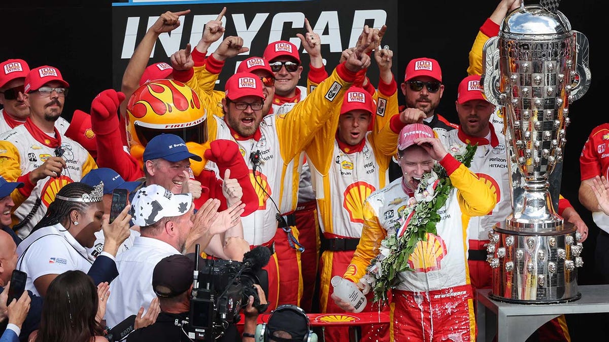 Josef Newgarden celebrates