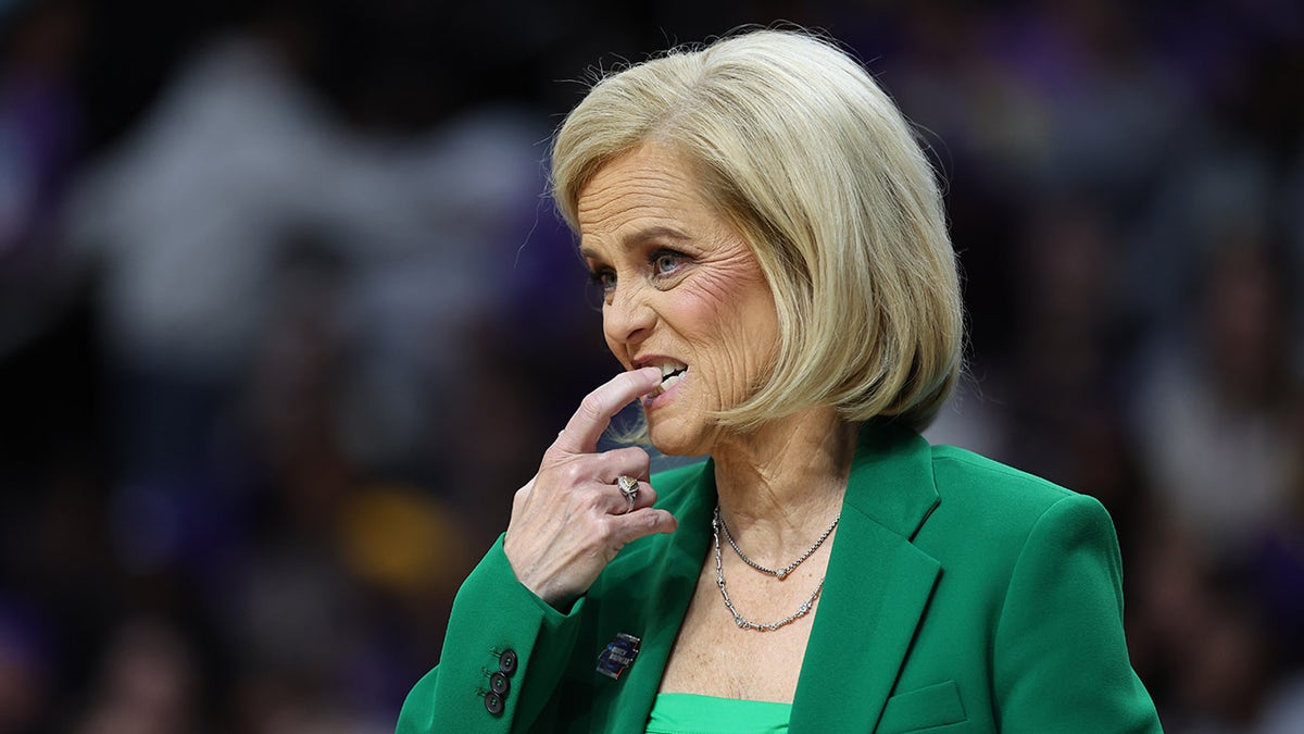 Kim Mulkey bites her nails