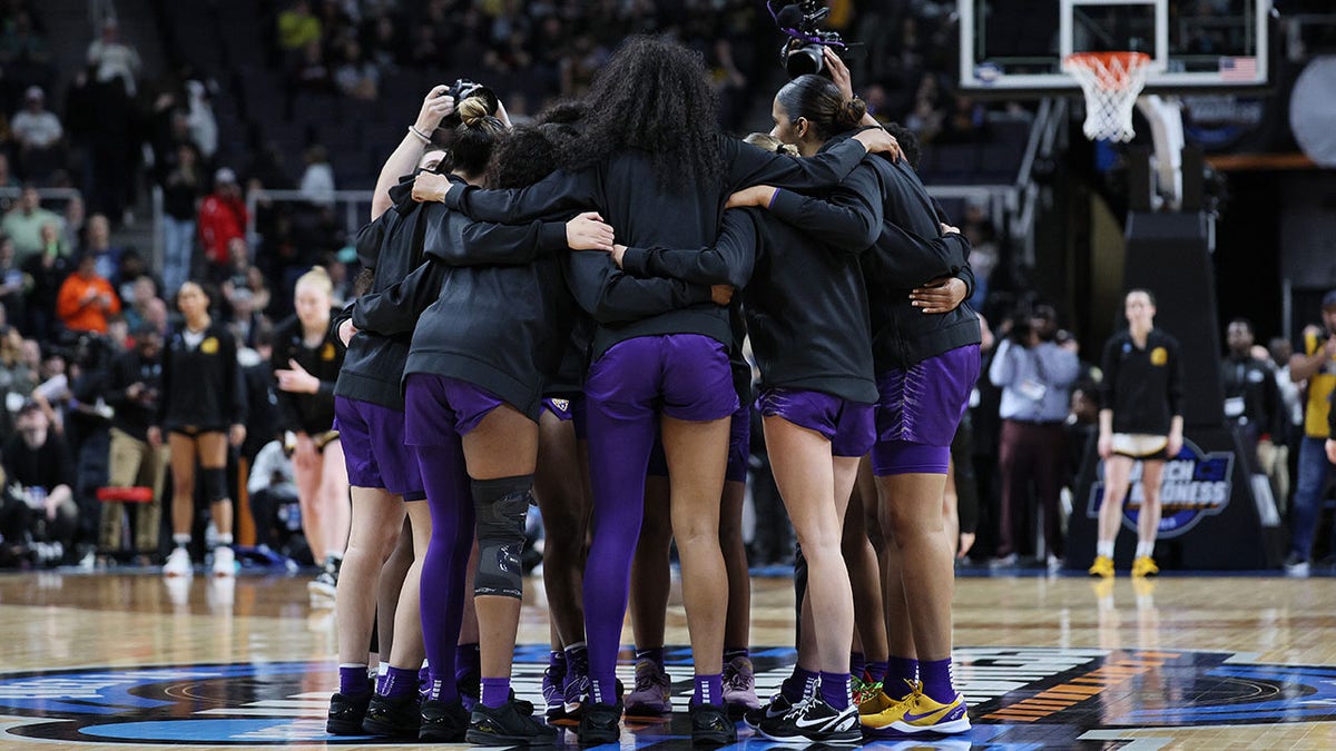 LSU players gather