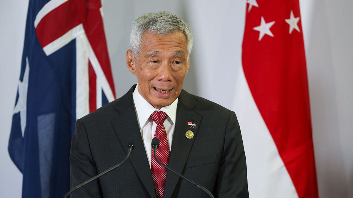 Singapore’s outgoing PM to stay on as senior minister, his successor says