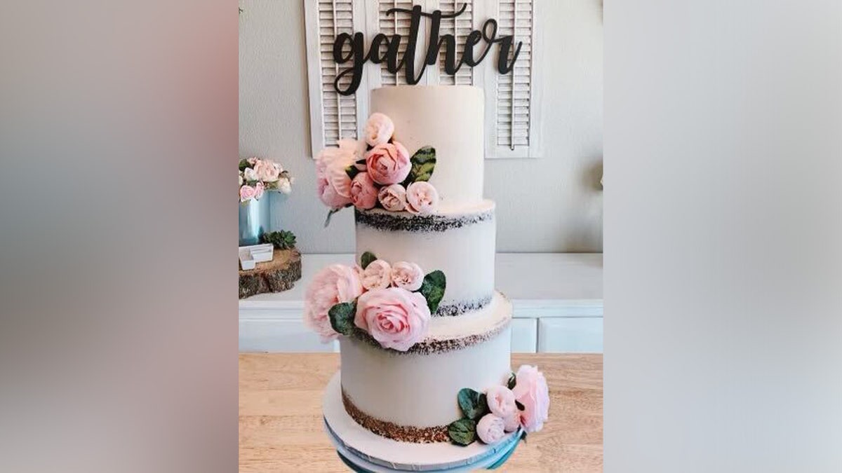 A custom design featuring a three-tiered cake created by Cassie Tingley’s small business, Love and Flour