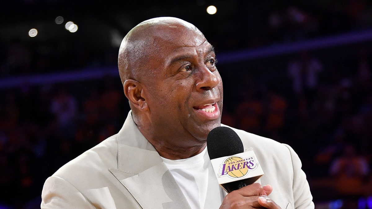Magic Johnson speaks during a ceremony