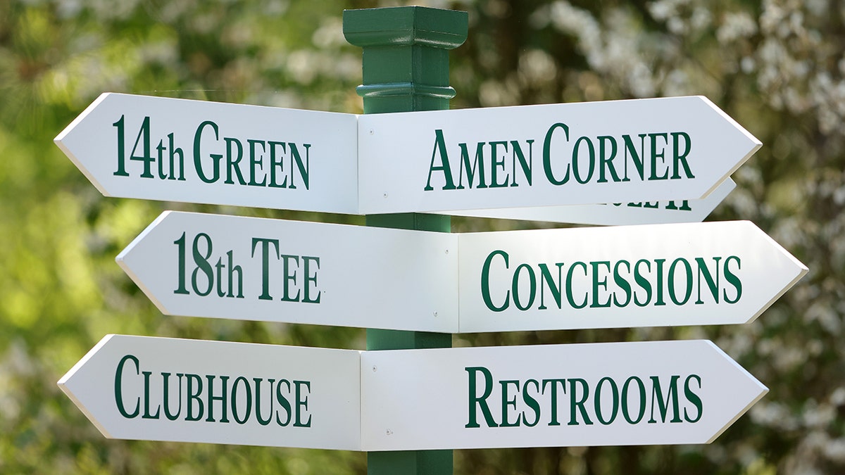 Sign at the Masters pointing in different directions