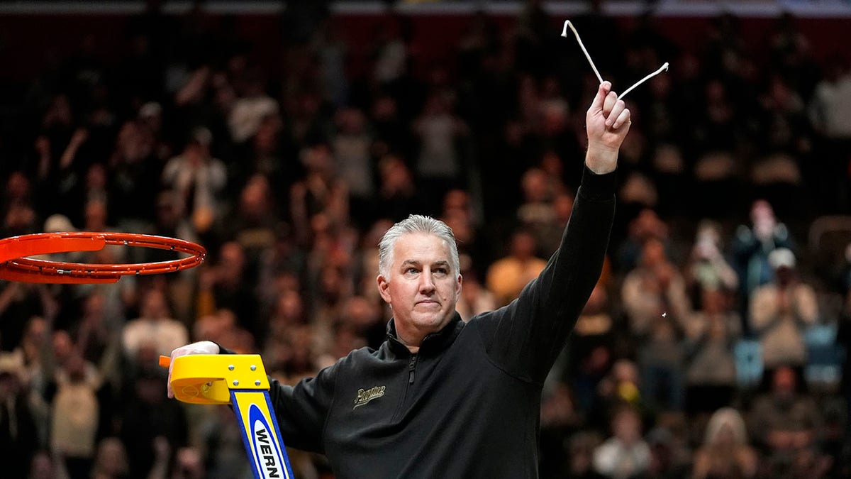 Matt Painter cuts down the nets