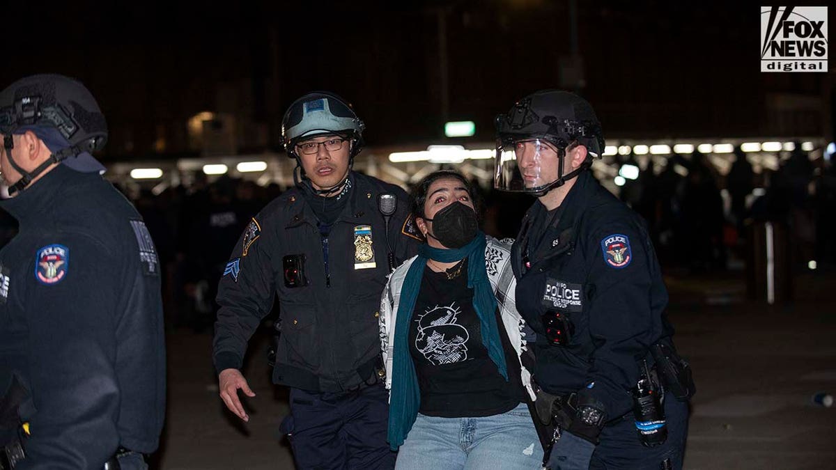 NYPD arrests student protesters on the campus of NYU.