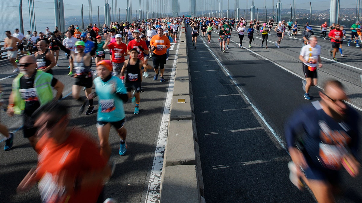 New York City Marathon participants run on Verrazano Bridge