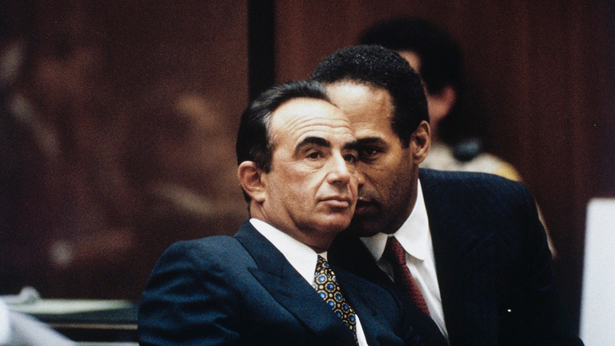 Robert Shapiro appears in court alongside his client, O.J. Simpson