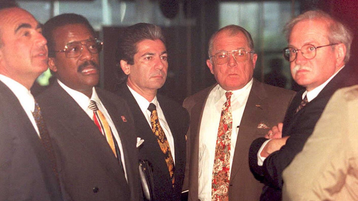 Robert Shapiro, Johnny Cochran Jr., Robert Kardashian, F. Lee Bailey and Gerald Uelmen wait for an elevator in the Criminal Courts Building