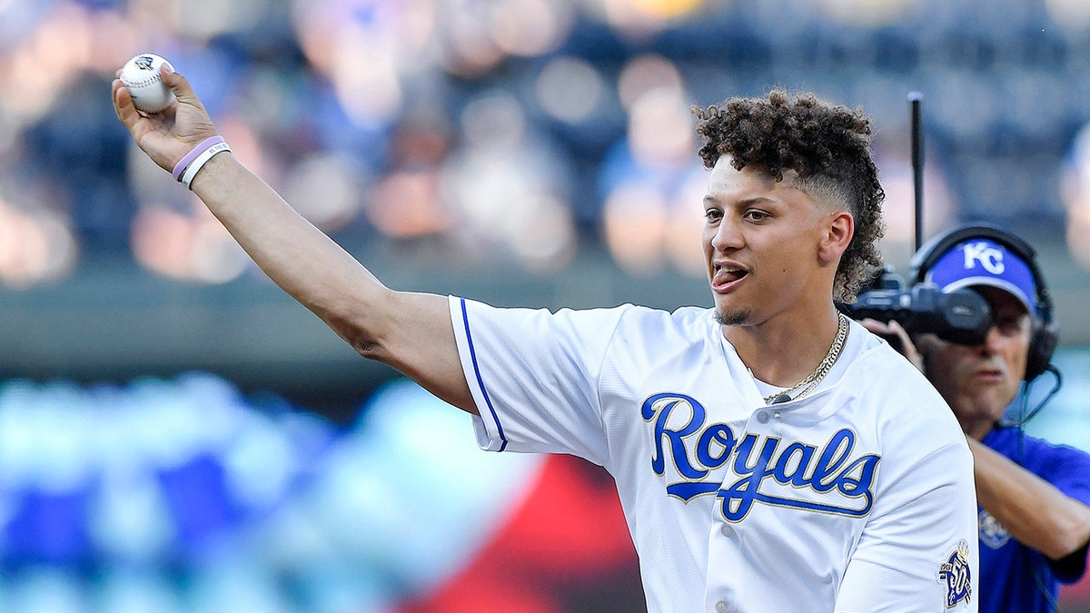 Patrick Mahomes throws out the pitch