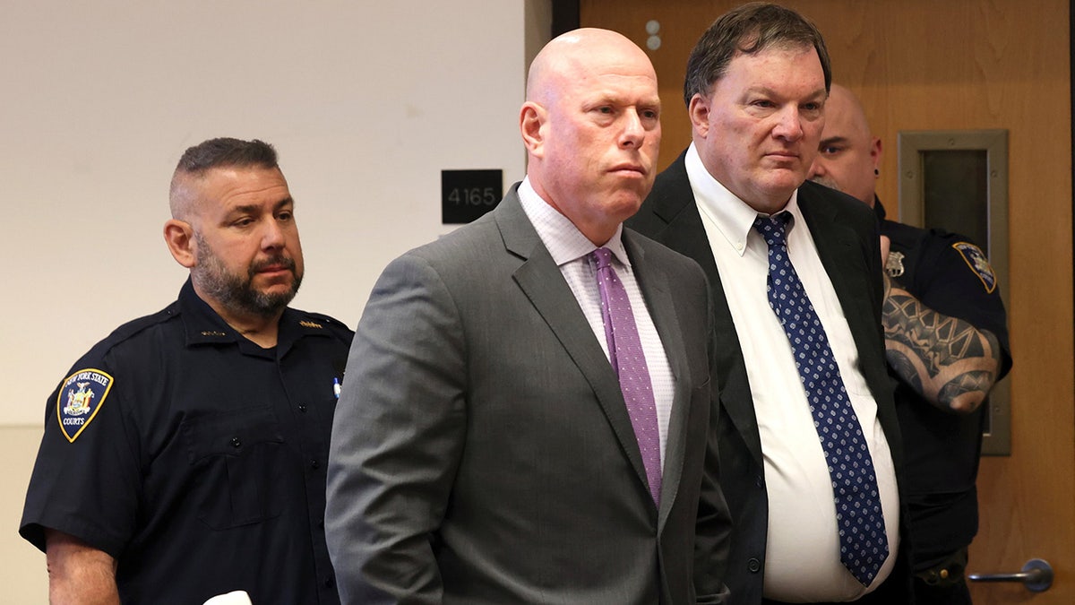Alleged Gilgo Beach serial killer Rex A. Heuermann appears in Judge Tim Mazzei’s courtroom next to his attorney Michael Brown