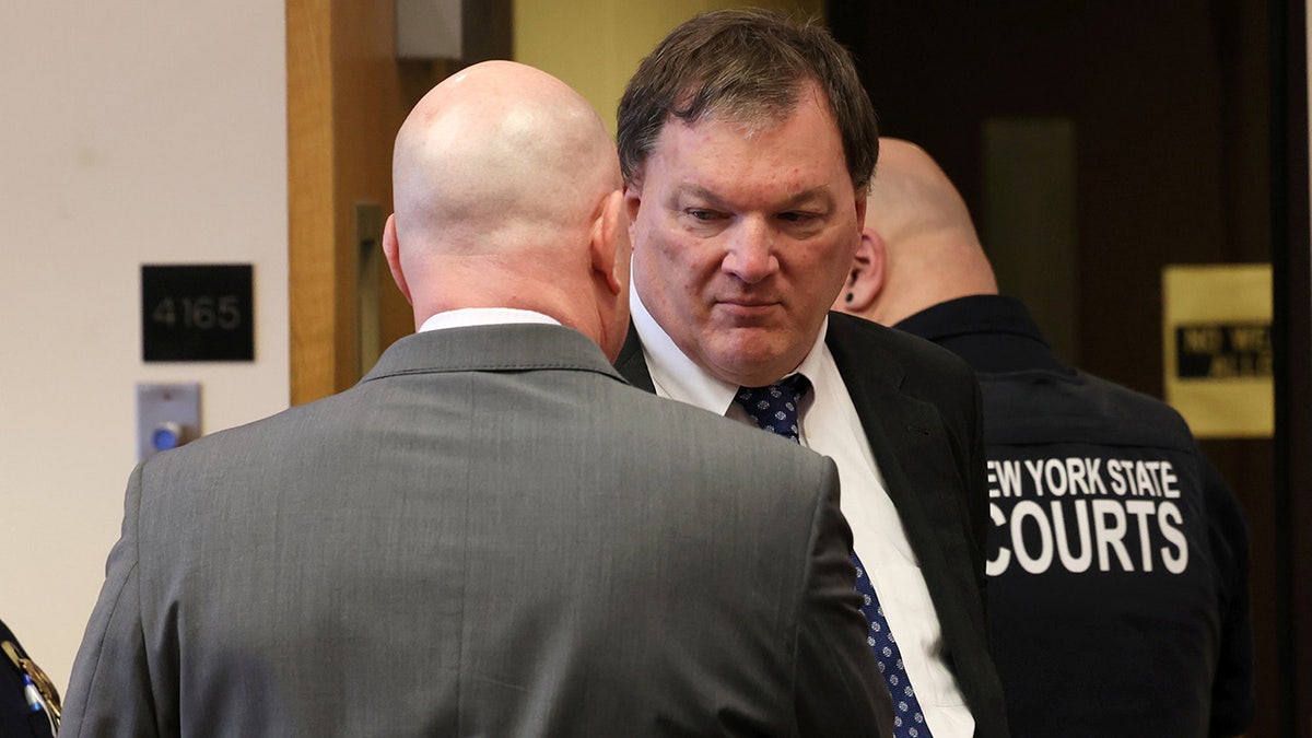 Alleged Gilgo Beach serial killer Rex A. Heuermann appears in Judge Tim Mazzei’s courtroom next to his attorney Michael Brown