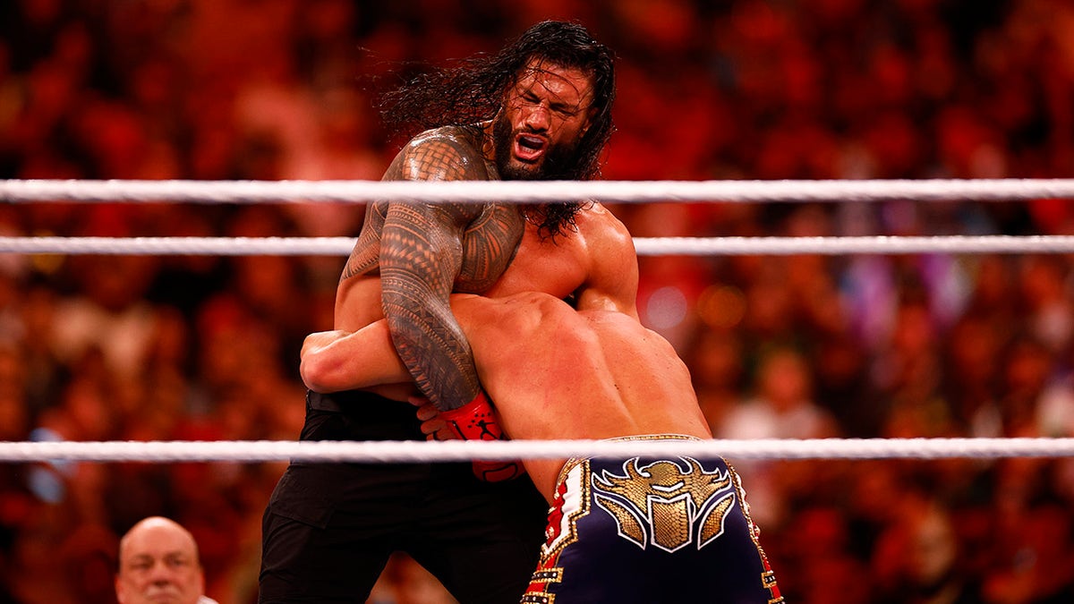Roman Reigns puts a move on Cody Rhodes