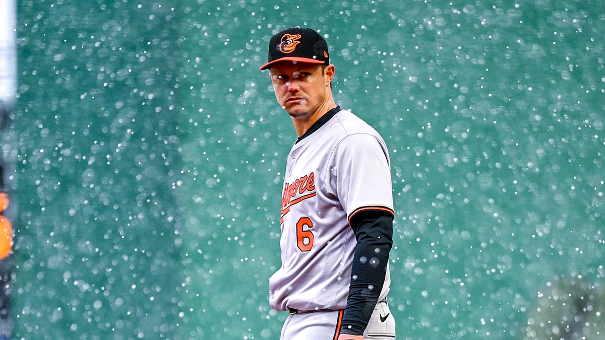 Ryan Mountcastle looks on field during snowstorm.