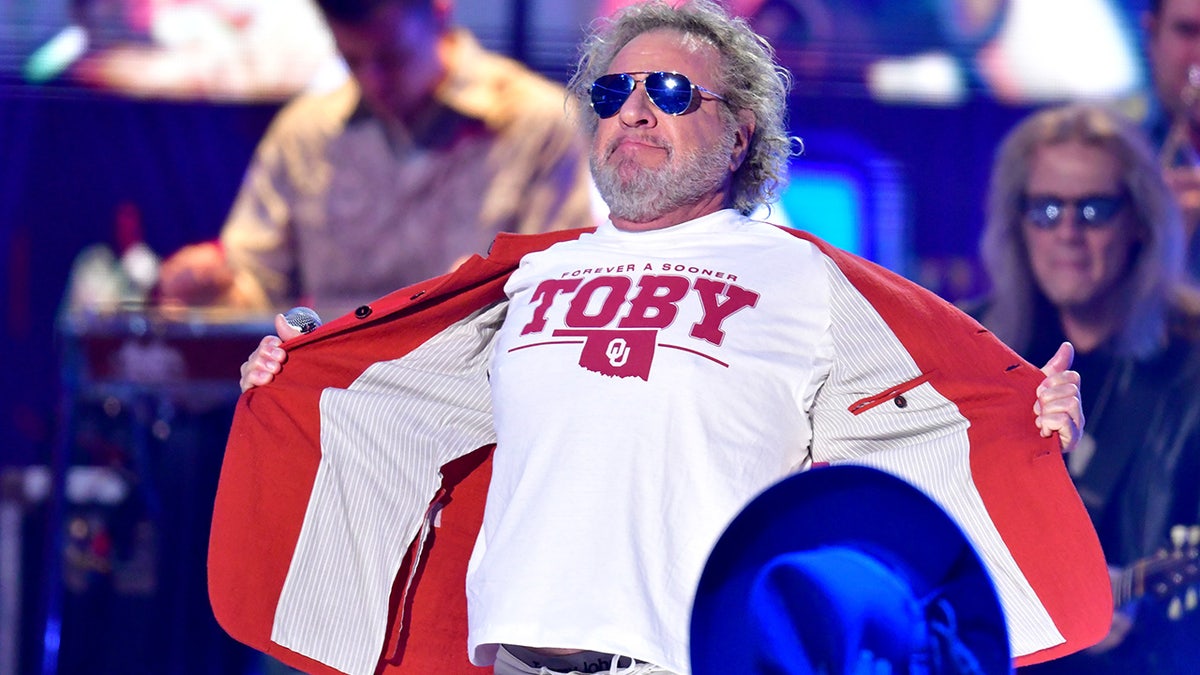 Sammy Hagar sports white T-shirt with Toby Keith's name.