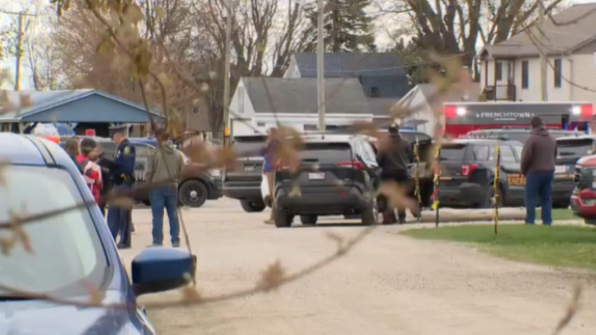 Wide shot of vehicles at scene