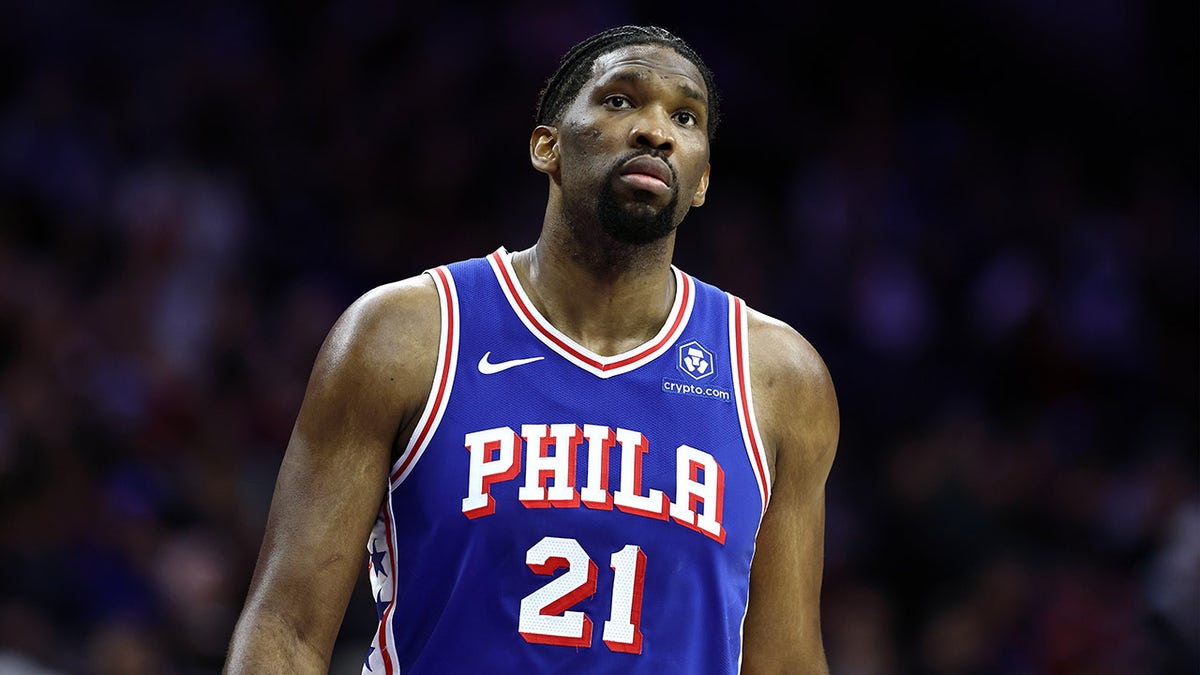 Joel Embiid looks connected  during a game