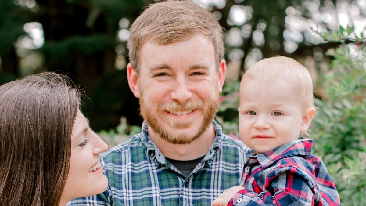 Tyler Wenrich, his woman and their toddler